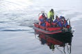 Polar landing boat returning tourists to cruise ship,