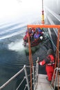 Polar landing boat returning cruise ship Royalty Free Stock Photo