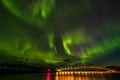 Dramatic aurora borealis, polar lights, over mountains in the North of Europe - Lofoten islands, Norway Royalty Free Stock Photo