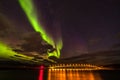 Dramatic aurora borealis, polar lights, over mountains in the North of Europe - Lofoten islands, Norway Royalty Free Stock Photo