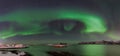 Polar lights, aurora borealis, northern lights and stars in the sky , Sommaroy, Vesteralen, Nordland, Norway