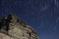 Polaris, star trails and rock.