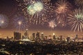 Polaroid of Downtown Los angeles cityscape with fireworks celebrating New Year's Eve.