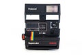 Polaroid instant vintage camera Royalty Free Stock Photo