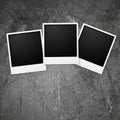 Polaroid photo frames on grunge wall