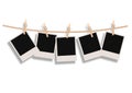 Polaroids Hanging on a Rope Royalty Free Stock Photo