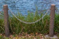 Pole and chain fence. Royalty Free Stock Photo