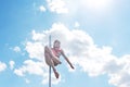 Pole dance fit woman exercising with pylon outdoors Royalty Free Stock Photo