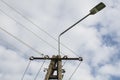 Pole with electric cables and lighting