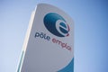 Pole emploi signboard on blue sky background, pole emploi is the french agency of job research Royalty Free Stock Photo