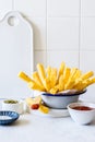 Polenta Chips with Ketchup and Pesto Royalty Free Stock Photo