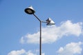 Poles led. Street light against the blue sky with clouds. copy space. Royalty Free Stock Photo