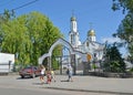 POLESSK, RUSSIA. Passersby go by the temple of the prelate Tikhon - the patriarch of Moscow and all Russia