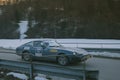 POLHOV GRADEC, SLOVENIA, 10.2.2023: Vintage Datsun 280ZX is driving on snowy public road as part of a winter oldtimer rally