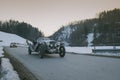 POLHOV GRADEC, SLOVENIA, 10.2.2023: Vintage oldtimer cabriolet is driving on snowy public road as part of a winter oldtimer rally