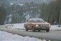 POLHOV GRADEC, SLOVENIA, 10.2.2023: Vintage Opel Manta A is driving on snowy public road as part of a winter oldtimer rally