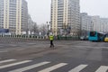 Police agent, Romanian Traffic Police Politia Rutiera directing traffic during the morning rush hour in downtown Bucharest,