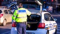 Police agent, Romanian Traffic Police (Politia Rutiera) directing traffic