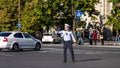 Police agent, Romanian Traffic Police (Politia Rutiera) directing traffic