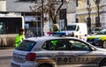 Police agents, Romanian Traffic Police Politia Rutiera directing traffic during the morning rush hour in downtown Bucharest,