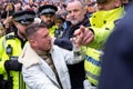 Police arrest far right agitator Tommy Robinson at the March Against Antisemitism, London, UK