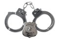 Police Badge and Handcuffs - Stock Photo Royalty Free Stock Photo