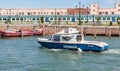 Police boat patrol the water canals in Venice, Italy. Royalty Free Stock Photo