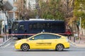 A police bus and a taxi in Athens