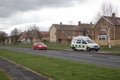 Police Camera Enforcement Unit Van parked at side of the road to enforce speed restrictions. Speed camera sign visable as blurred