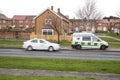 Police Camera Enforcement Unit Van parked at side of the road to enforce speed restrictions.  Speed camera sign visable as blurred Royalty Free Stock Photo