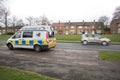 Police Camera Enforcement Unit Van parked at side of the road to enforce speed restrictions.  Speed camera sign visable as blurred Royalty Free Stock Photo