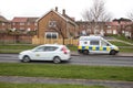 Police Camera Enforcement Unit Van parked at side of the road to enforce speed restrictions.  Speed camera sign visable as blurred Royalty Free Stock Photo