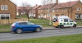 Police Camera Enforcement Unit Van parked at side of the road to enforce speed restrictions. Speed camera sign visable as blurred