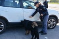 Police with canine units carry out checks
