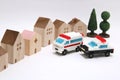 Police car and ambulance heading to hospital on white background. Royalty Free Stock Photo