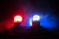 Police car blue and red round vintage siren in dark. Rotating retro style police siren in dark