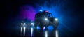 Police car chasing a car at night with fog background. 911 Emergency response police car speeding to scene of crime. Selective foc Royalty Free Stock Photo