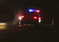 Police car, cop pursuit in night blue red light Royalty Free Stock Photo