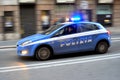 Police car with cops in Rome , Italy