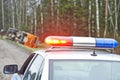 Police car with a flasher at lorry crash Royalty Free Stock Photo