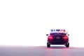 Police car with flashing lights, isolated on a white background, copy space Royalty Free Stock Photo