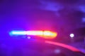 Police car flashing lights in the night blurred selective focus Royalty Free Stock Photo