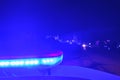 Police car flashing lights in the night selective focus Royalty Free Stock Photo