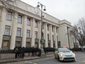 A police car guards public safety near the building of the Verkhovna Rada of Ukraine