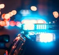 Police car lights at night in city with selective focus and bokeh. Generative AI Royalty Free Stock Photo