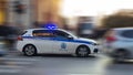 police car moving fast in greece greek Royalty Free Stock Photo