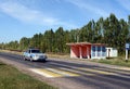 Police car before the pedestrian crossing on the highway in the Voronezh region.