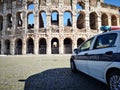 Rome, Italy. November 2020. Police car of Roma Capitale in garrison in front of the Colosseum
