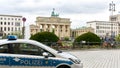 Police Car stationed near the famous Brandenburg Gates in Berlin, Germany