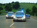 Police cars barricade highway